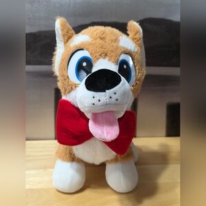 Adorable Plush Puppy with Red Bow